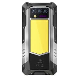 Smartphone rugerizado con carcasa amarilla y negra, bordes metálicos reforzados, triple cámara trasera con flash y módulo NFC; diseño robusto y resistente