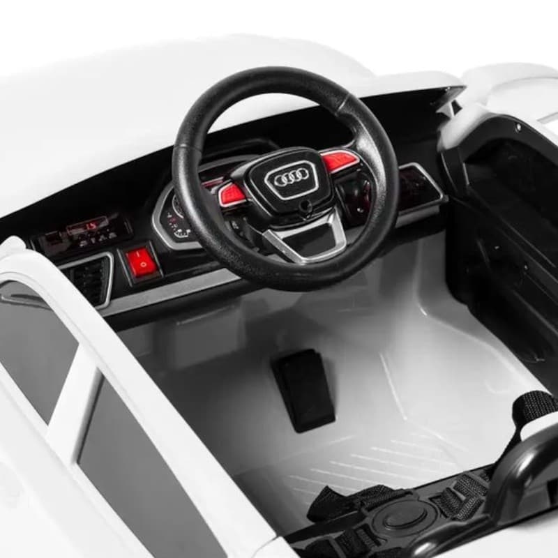 Audi Q5 12V Blanco - Coche eléctrico para niños con volante deportivo, salpicadero detallado, indicadores rojos y cinturón de seguridad en interior negro y