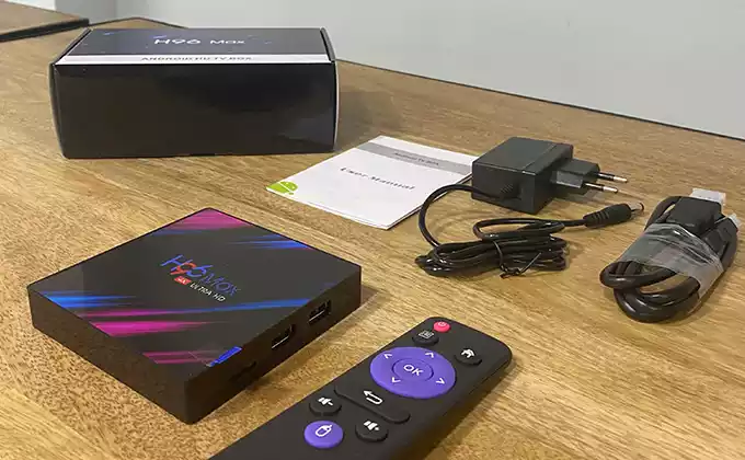 H96 max com todos os componentes do unboxing e da caixa, aparelho, manual e fonte de alimentação e cabo HDMI