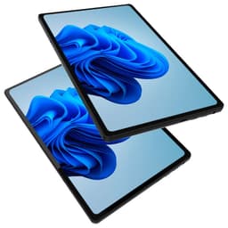 Tablet PC cinzento com ecrã de 12 polegadas, molduras finas e Windows 11 exibido; corpo fino, cantos arredondados e portas laterais visíveis
