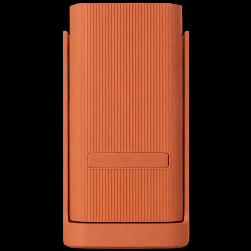 Funda naranja texturizada para Proyector Wanbo Cube 1, diseño antideslizante con ranuras verticales y bordes protectores, acabado mate elegante