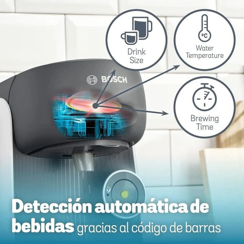 Bosch Tassimo Finesse TAS16B4 blanca con panel frontal gris, botón central iluminado y boquilla frontal; destaca detección automática por código de barras