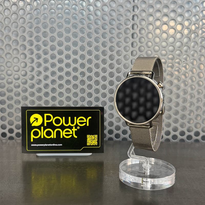 Xiaomi Watch S4 41 mm dourado com pulseira milanesa em aço inox, corpo fino e redondo, tela circular apagada, fecho magnético elegante em suporte transparente