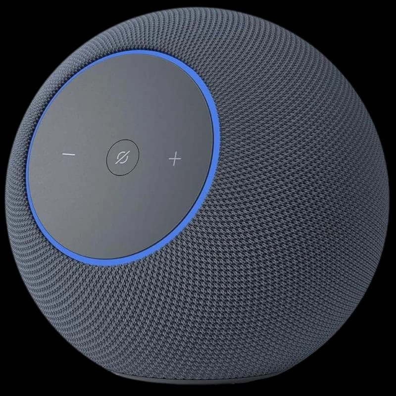 Amazon Echo Studio Grafito, altavoz esférico gris con malla textil, aro LED azul y panel superior con botones +, − y acción. Diseño moderno y minimalista