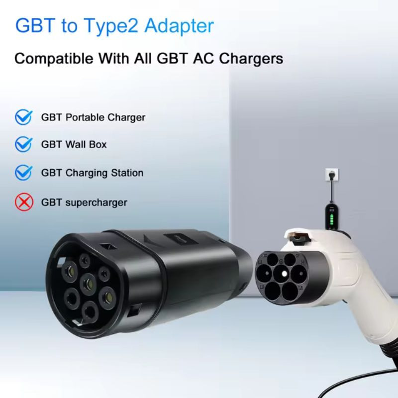 Adaptador EV GBT a Tipo 2 negro, diseño cilíndrico robusto, conector de 7 pines visible y tapa protectora, ideal para carga de coche eléctrico - Ítem1