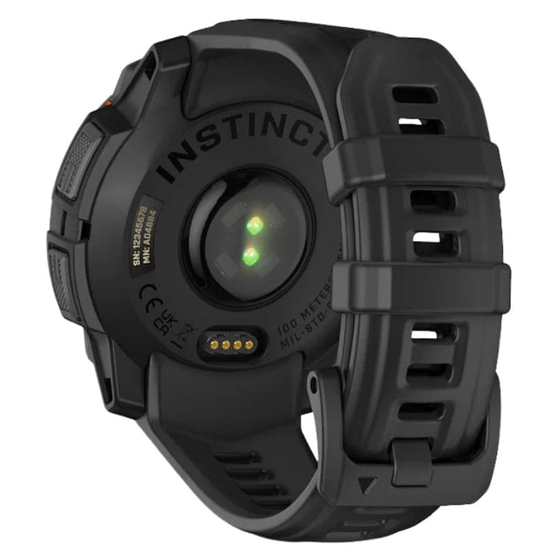 Parte traseira do Garmin Instinct 3 45 mm Solar Preto com pulseira de silicone preta, sensor óptico verde, carregamento por pinos e fecho robusto ajustável