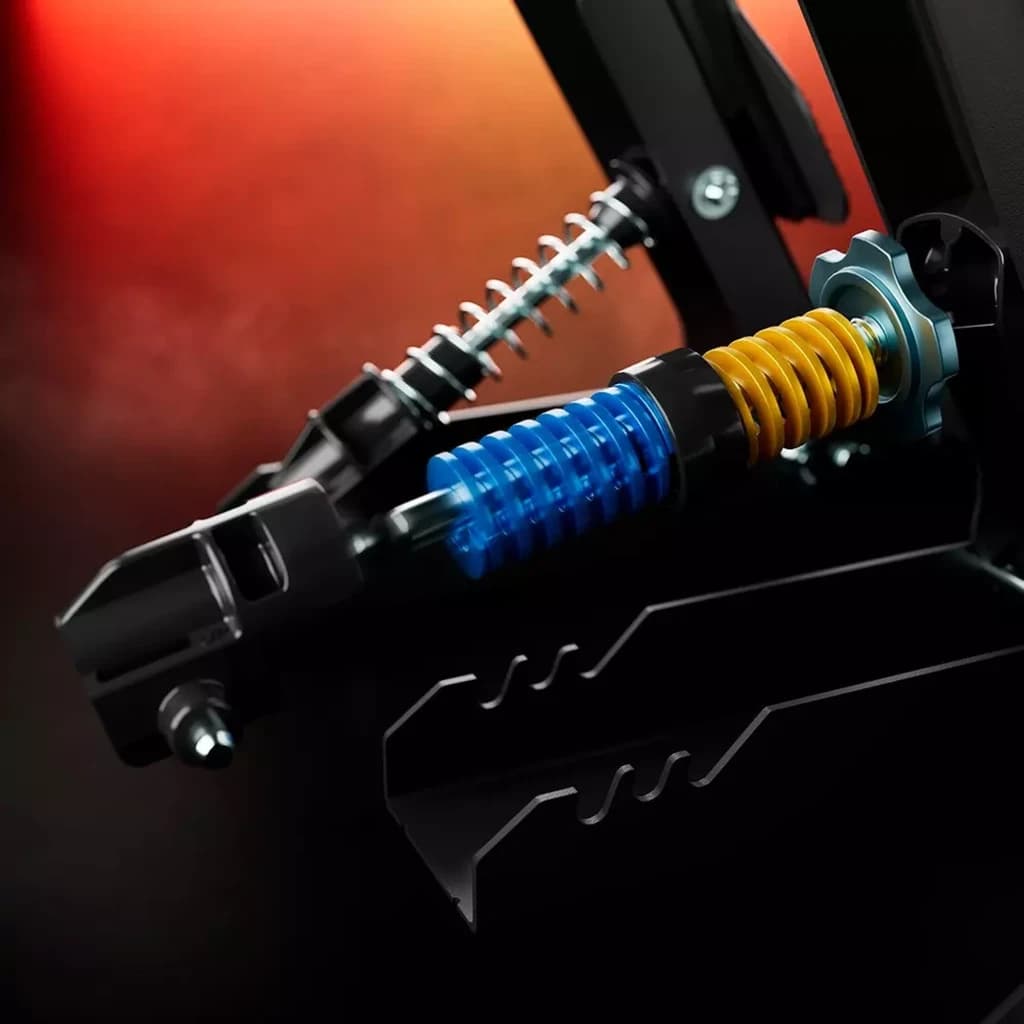 Muelle de pedal con resortes azul y amarillo y ajuste por perilla, construcción metálica robusta y ranuras de montaje para la pedalera Thrustmaster RACE