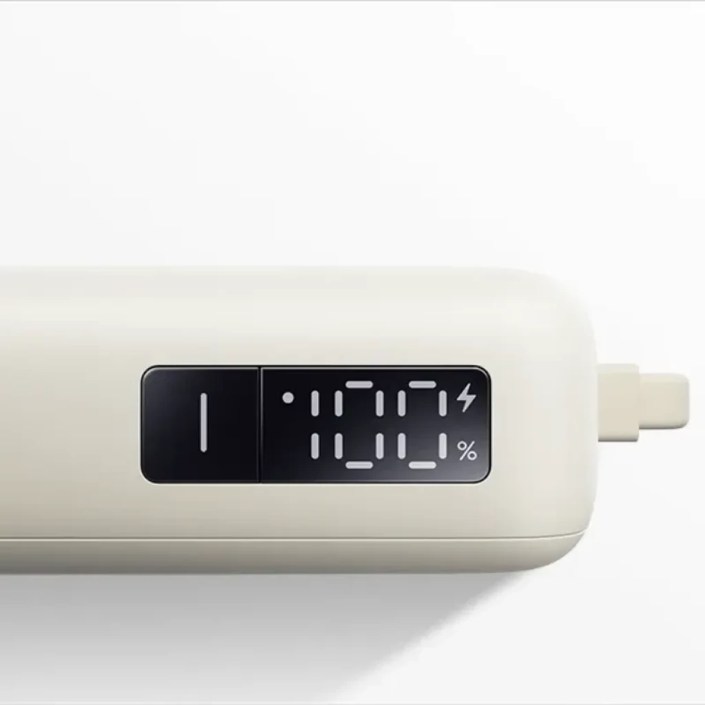 Xiaomi 67W Power Bank 10000 Beige con cable integrado, diseño compacto y minimalista, acabado mate, correa de transporte y marca 67W MAX en relieve - Ítem4