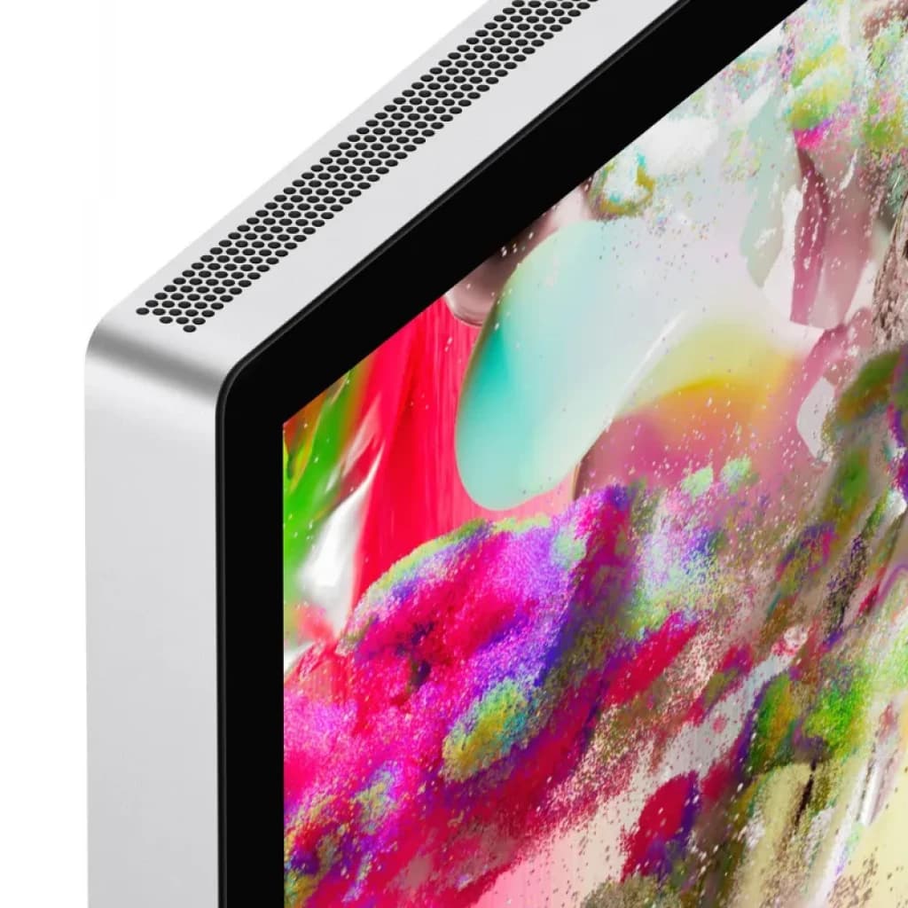 Bord supérieur du Studio Display 27 pouces en aluminium, écran Retina 5K avec verre nanostructuré, bords fins et grille d’aération perforée élégante