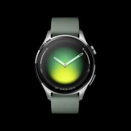 Xiaomi Watch 5 Verde Enebro com caixa prateada, mostrador circular gradiente verde-amarelo, ponteiros minimalistas e pulseira têxtil verde com textura