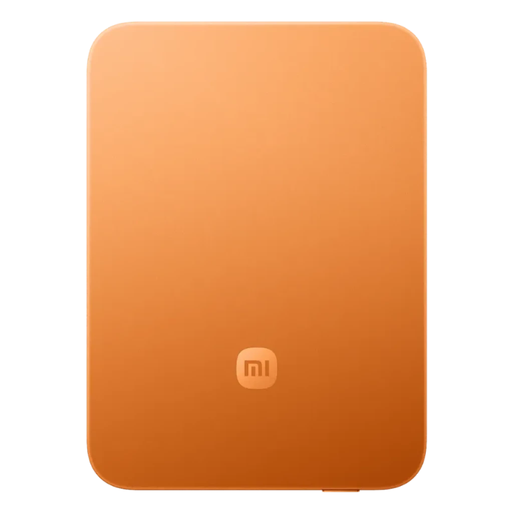 Power bank magnético ultradelgado naranja con acabado mate, anillo MagSafe visible, bordes redondeados y logo mi al frente - Ítem2