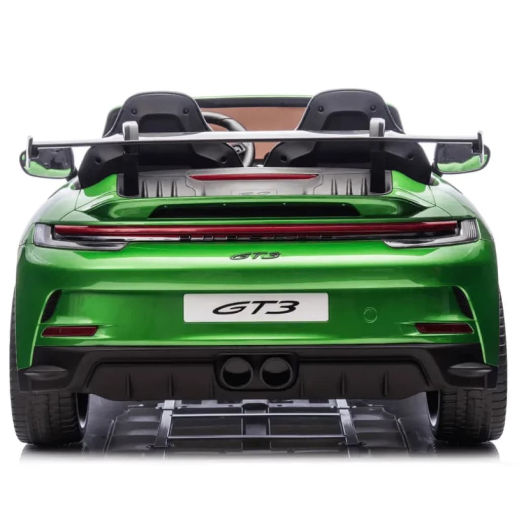 Porsche 911 GT3 12V Verde para niños, vista trasera: alerón deportivo, doble escape central, luces LED continuas y detalles negros en parachoques y difusor