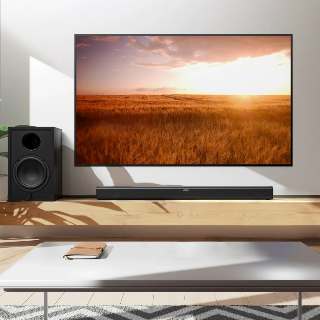 Tribit Soundbar 2.2 200 W com subwoofer preto, barra delgada frontal com grade metálica, display central discreto e controle remoto compacto - Item6