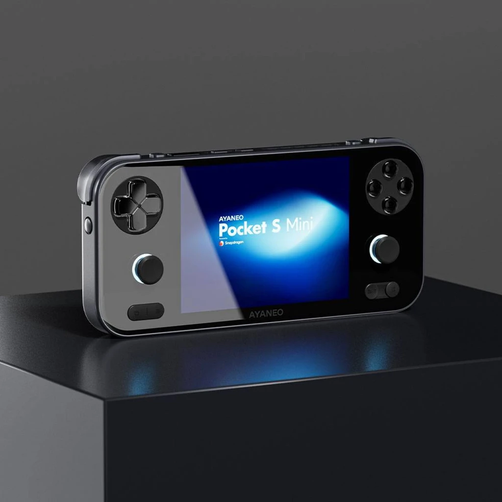 Console portable noire compacte avec écran LCD 4,2 pouces 4:3, croix directionnelle à gauche, deux sticks, quatre boutons à droite et haut‑parleurs - Ítem1