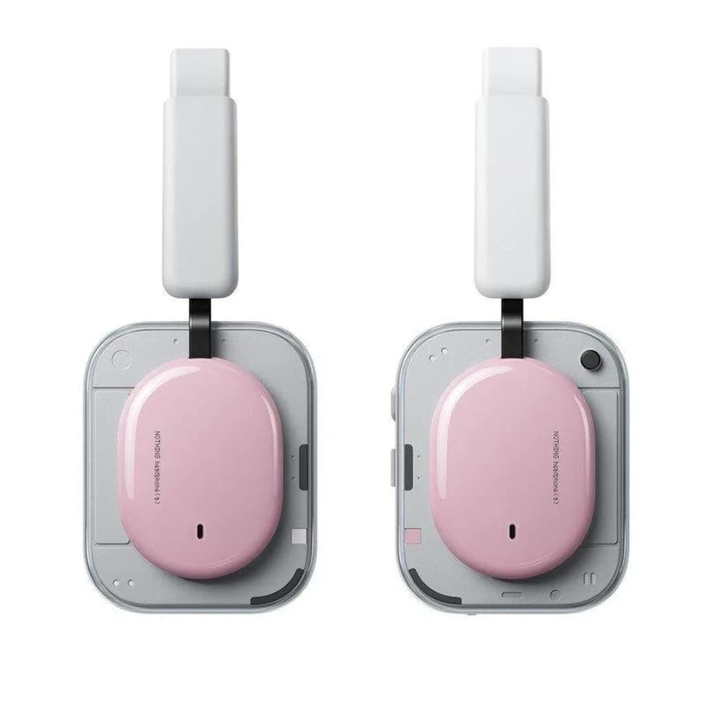 Nothing Headphone a Rosa com diadema: conchas ovais rosa, hastes brancas, design minimalista, acolchoamento visível e detalhes modulares em cinza