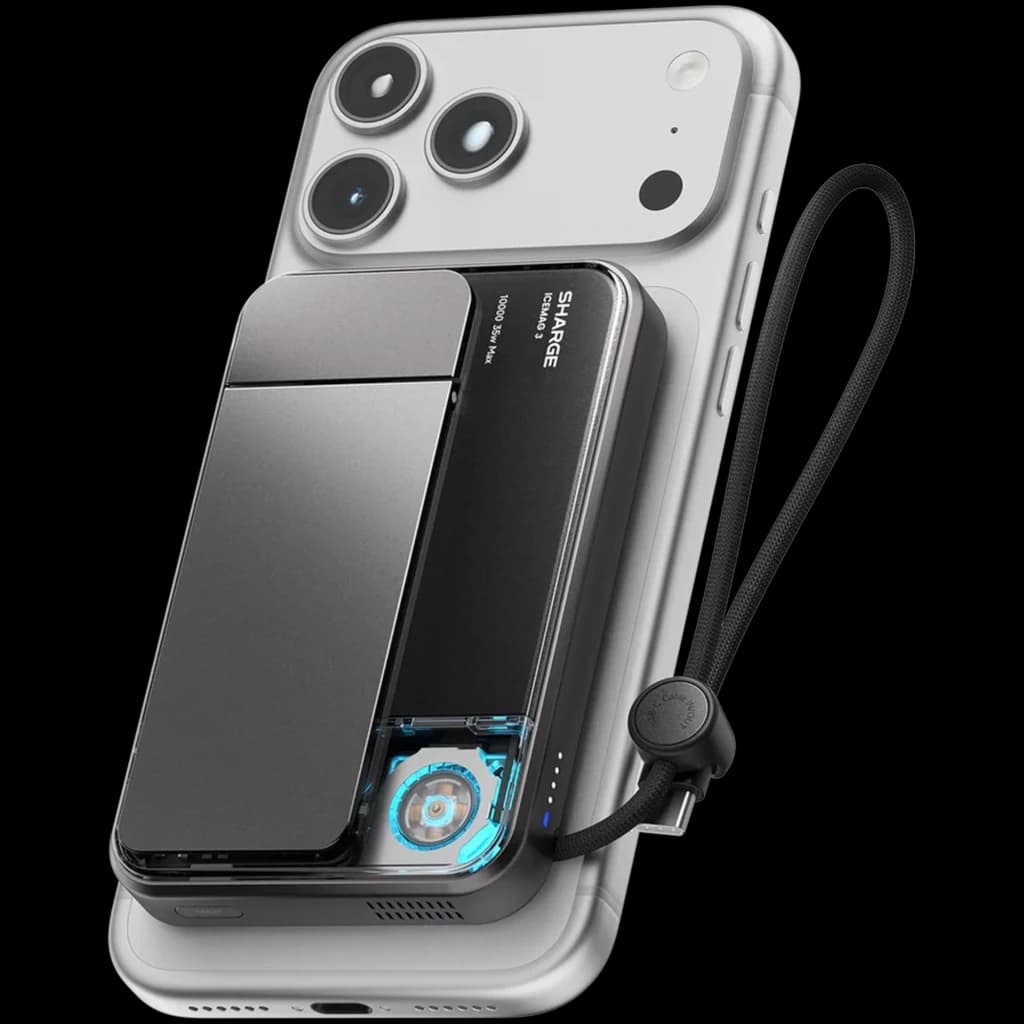 Power bank magnético negro con ventilador visible, enfriamiento activo, carga Qi2 25W, 10000 mAh, indicador LED y correa, acoplado a un smartphone plateado