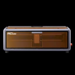 Creality Falcon A1 10W com câmara integrada, tampa protetora âmbar, estrutura metálica, botão lateral vermelho e visor frontal
