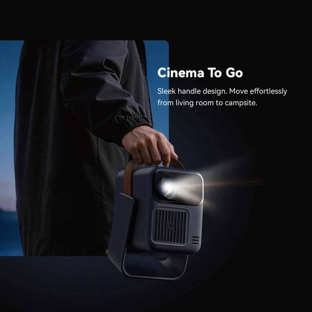 Proyector portátil Wanbo ToGo Pro 1080p, carcasa azul oscuro con asa marrón, lente frontal destacada y rejilla de ventilación grande para mejor enfriamiento - Ítem3
