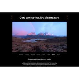Écran affichant 8 focales pro: 460 mm à Macro, paysages montagneux au crépuscule avec arc-en-ciel, couleurs vives et détails nets, style Hasselblad