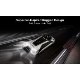 Smartphone robuste noir au design inspiré des supercars, dos métallique avec écran secondaire circulaire et éléments LED, look agressif et futuriste