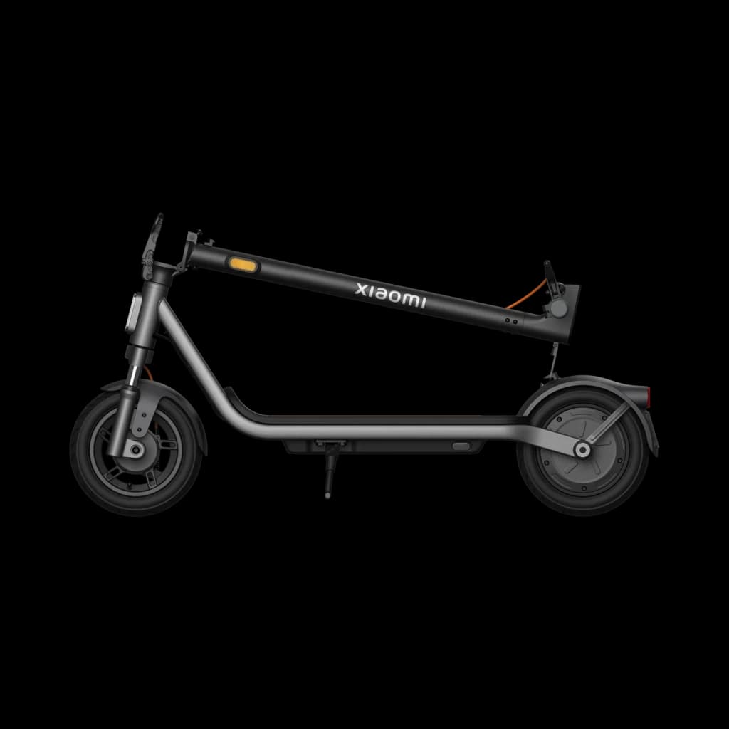 Patinete eléctrico Xiaomi 6 Lite plegado, color negro, chasis robusto, neumáticos de 10 pulgadas, timbre y luz delantera visibles, cable naranja en el tubo