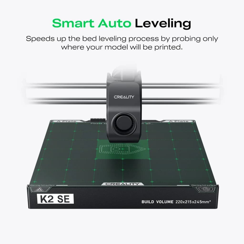 Creality K2 SE cama de impresión con autonivelado inteligente, sensor central y superficie negra con cuadrícula verde; volumen 220 × 215 × 245 mm, 500 mm/s