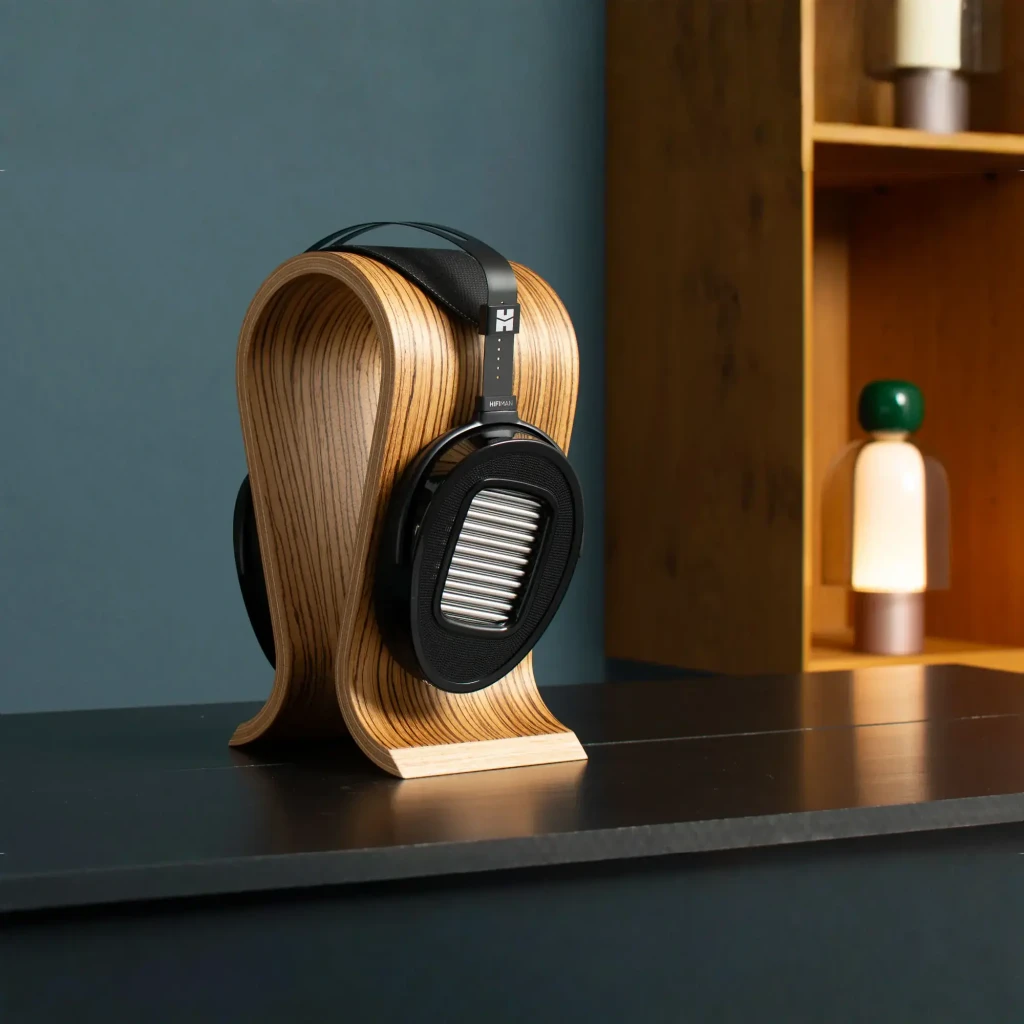 Casque Hifiman Arya Unveiled circum-aural noir, coques ovales grillagées, larges transducteurs planaires visibles, arceau perforé, câble jack 6,35 mm - Ítem7