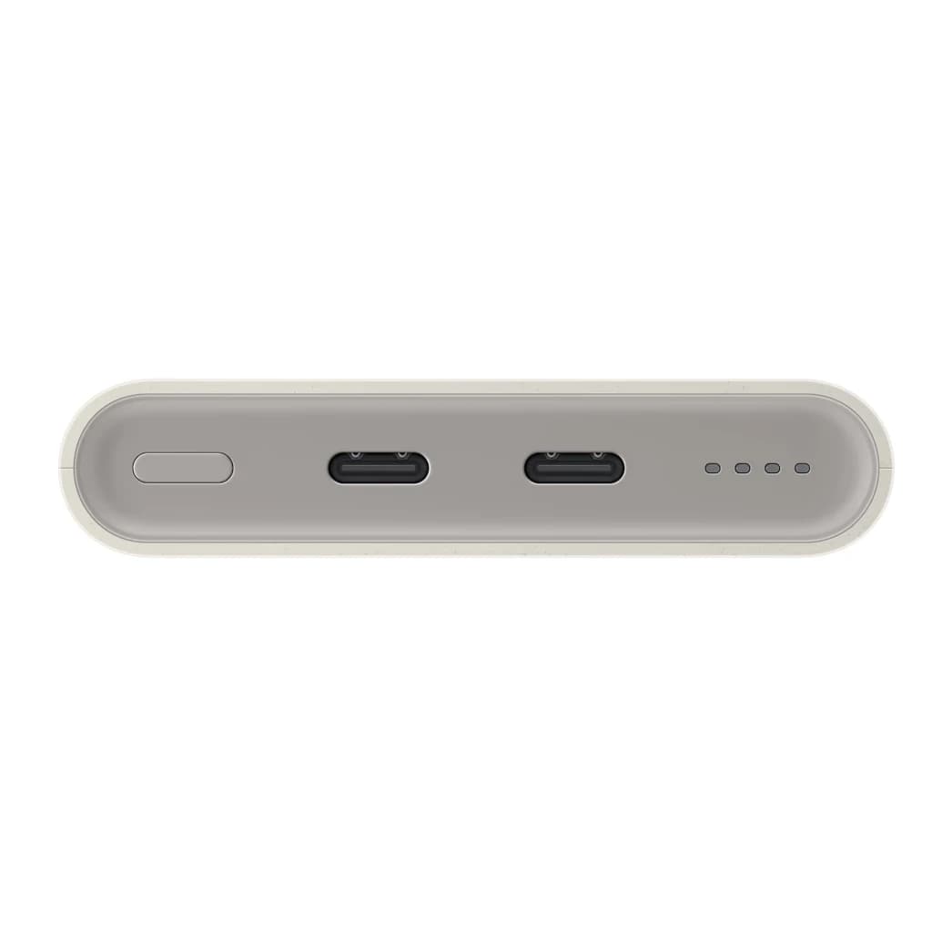 Power bank beige compacto con 2 puertos USB-C frontales, botón lateral y 4 luces LED de estado; bordes redondeados y diseño minimalista Samsung
