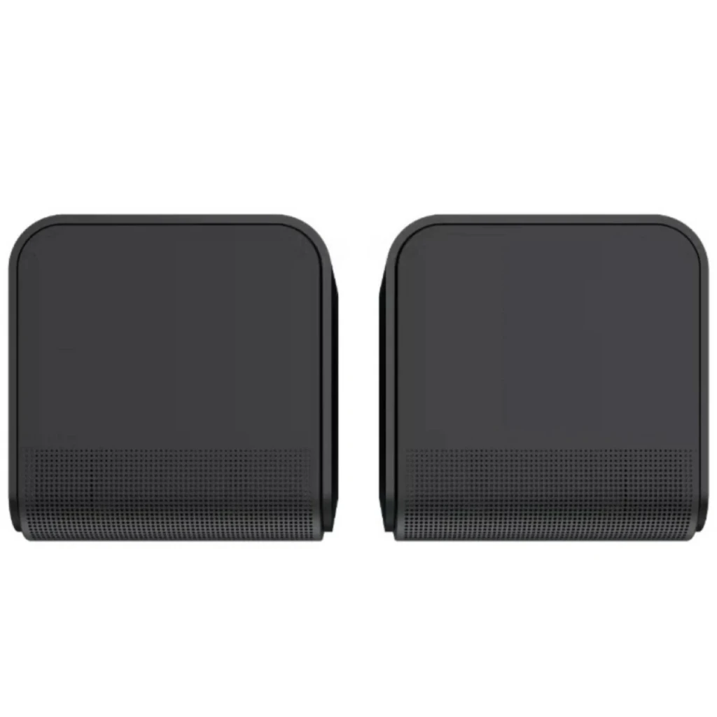 Par de altavoces Klipsch compactos negros con rejilla metálica gris, diseño minimalista de bordes redondeados y logotipo frontal, estilo surround moderno - Ítem1