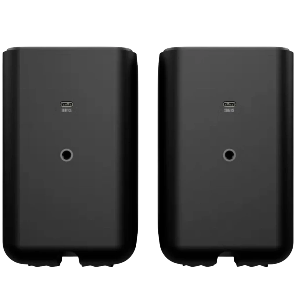 Par de altavoces Klipsch compactos negros con rejilla metálica gris, diseño minimalista de bordes redondeados y logotipo frontal, estilo surround moderno - Ítem2