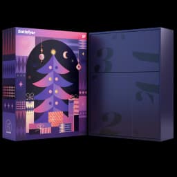 Caixa Satisfyer Love Box com arte natalina roxa e rosa, árvore decorada, presentes e números grandes nas abas internas, design premium e festivo