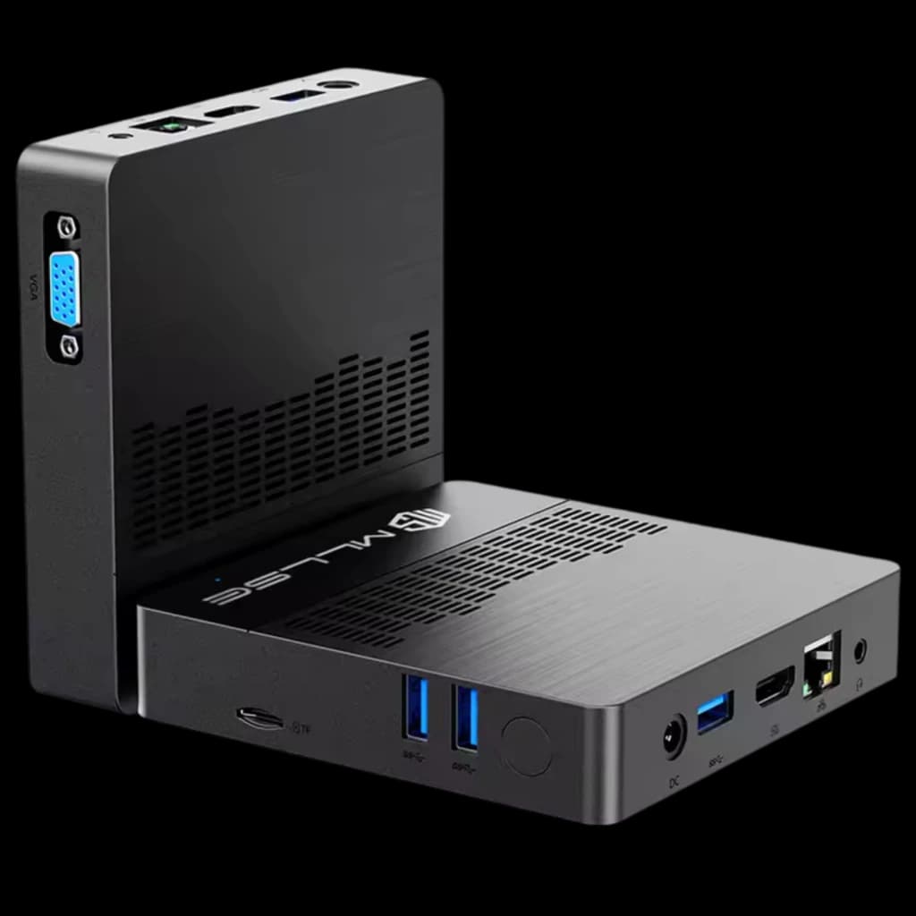Mini PC MLLSE M2 Air Intel N4000 negro, 6 GB RAM, 128 GB. Chasis metálico con rejillas, puertos USB 3.0, HDMI, VGA, RJ45 y audio. Compacto y elegante.