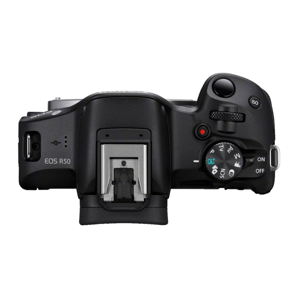 Vue supérieure du Canon EOS R50 noir avec molette de modes, bouton ISO, interrupteur ON OFF, griffe flash et commande d’enregistrement, design compact et