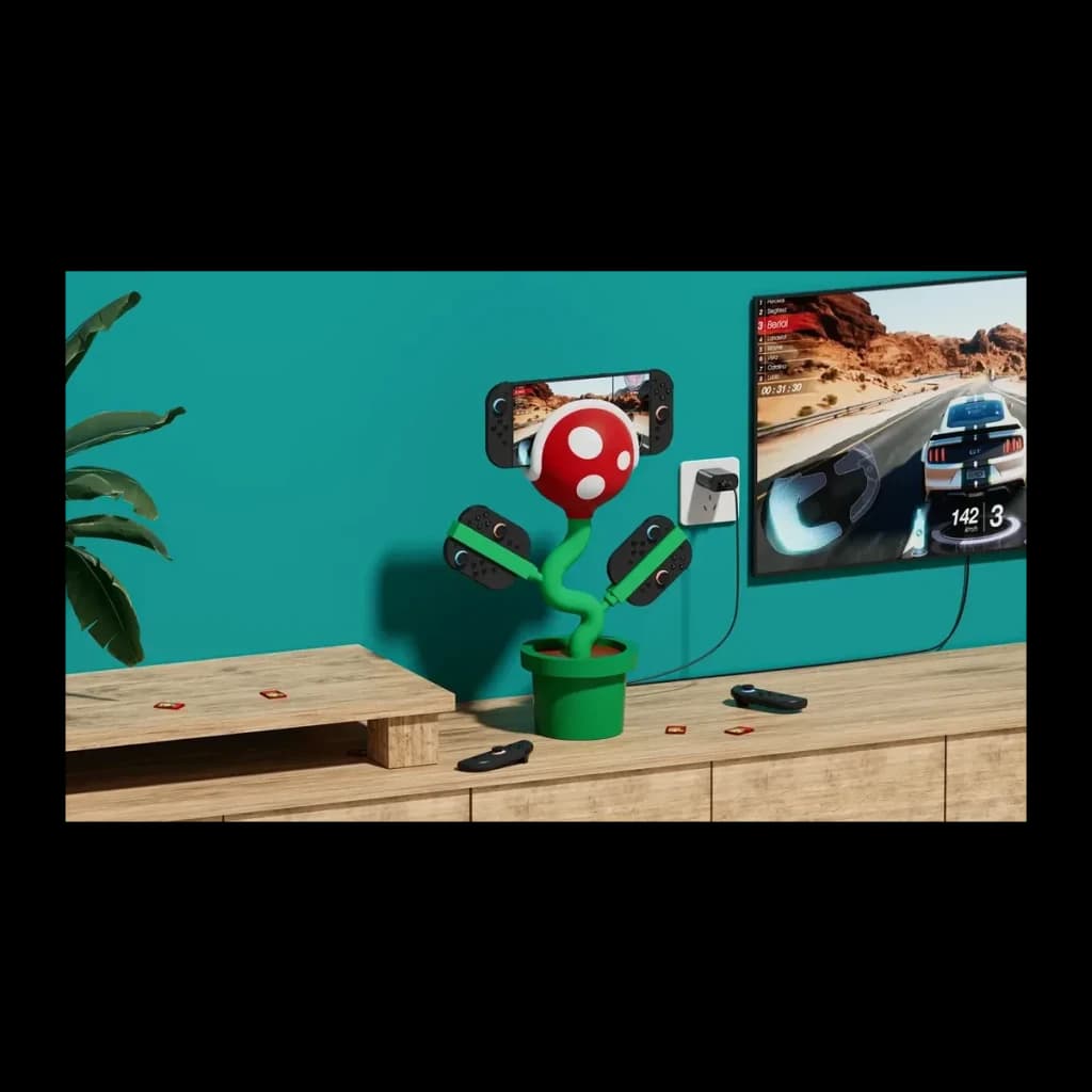 Dock POJUN Powkong Piranha PK02, vista lifestyle: dock em forma de planta piranha com consola, ligado a TV com jogo