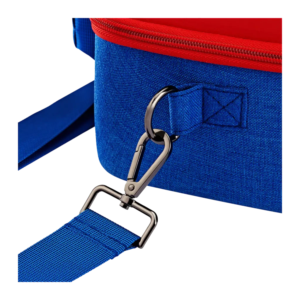 Funda rígida de viaje azul con tapa roja, cremalleras dobles, asa acolchada y correas azules con botones amarillos para proteger Nintendo Switch 2 - Ítem3