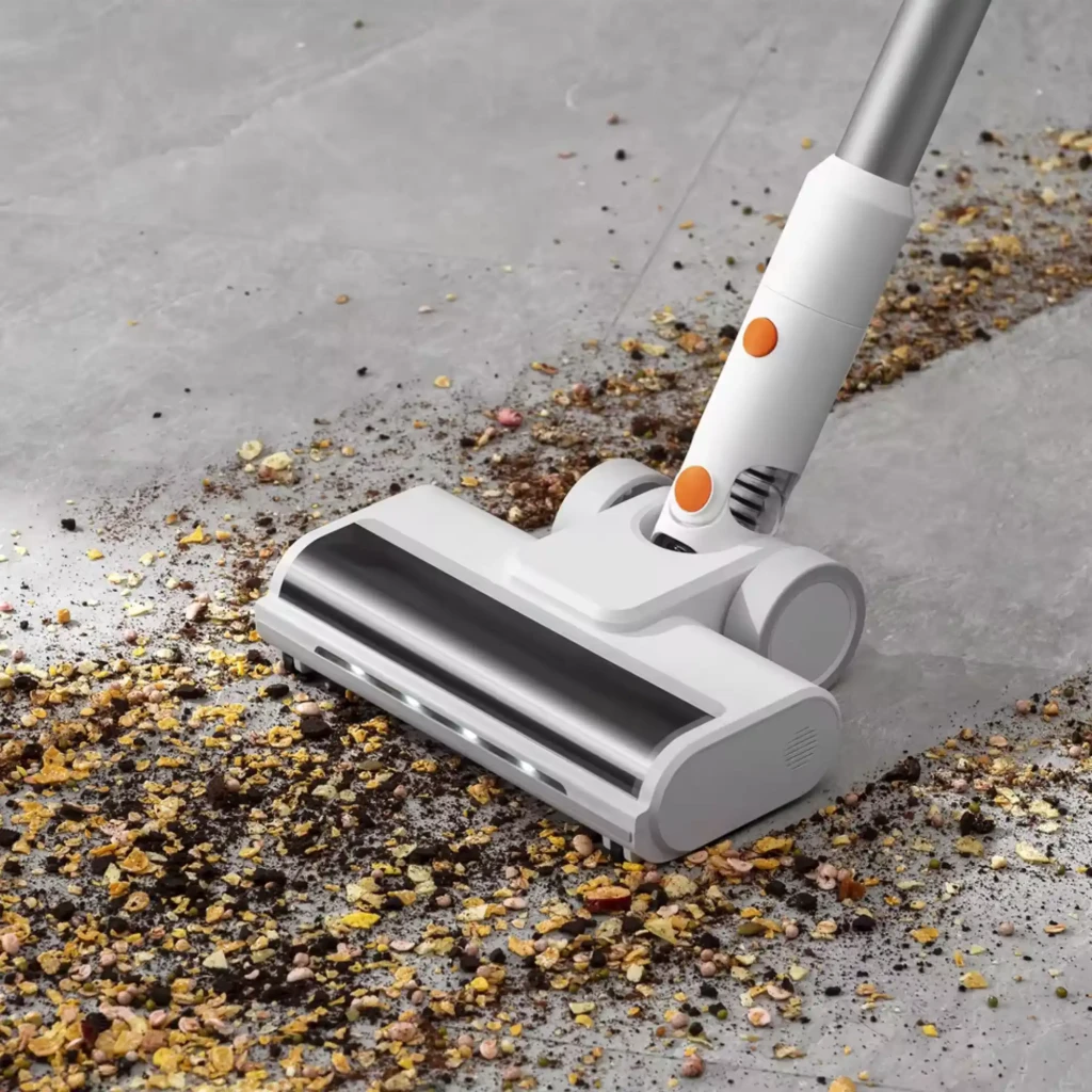 JONR VC10 Pro aspiradora escoba sin cable, cuerpo blanco con detalles naranjas, tubo largo, cabezal motorizado y base de carga compacta separada - Ítem1