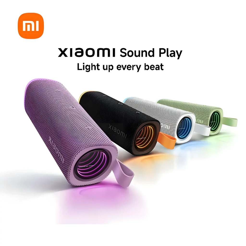 Coluna Bluetooth Xiaomi Sound Play preta com alça laranja, corpo retangular em tecido, botões frontais e base laranja; design robusto e portátil IP68 - Item2