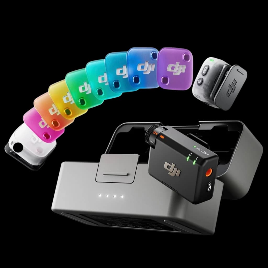 DJI Mic Mini 2 kit: estuche cargador gris con RX y 2 TX negros, clip magnético, rueda de ganancia, LEDs de estado y tapas de colores intercambiables