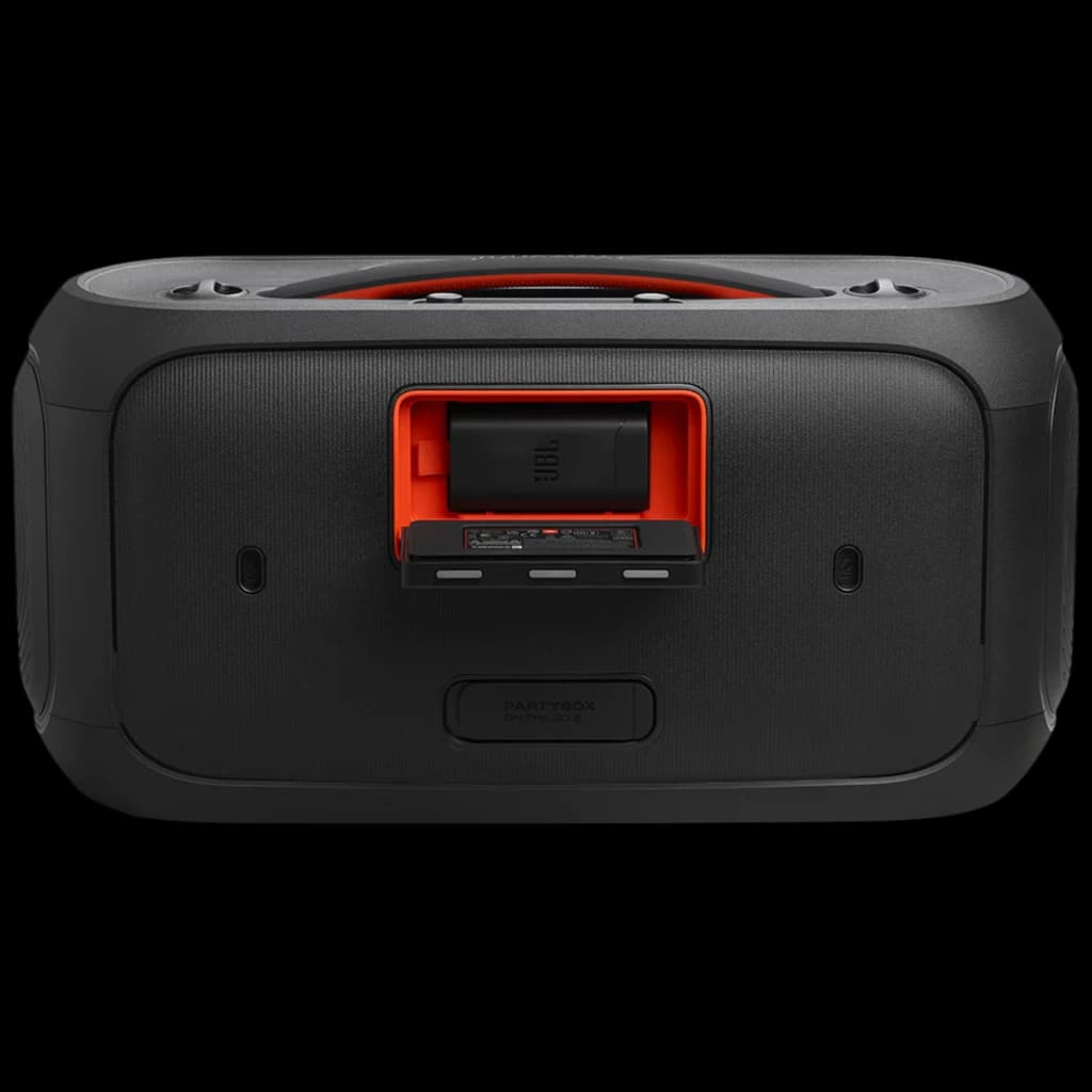 Panneau arrière noir avec compartiment batterie orange, poignée intégrée, évents latéraux et cache caoutchouté pour ports, design robuste IPX4 portable