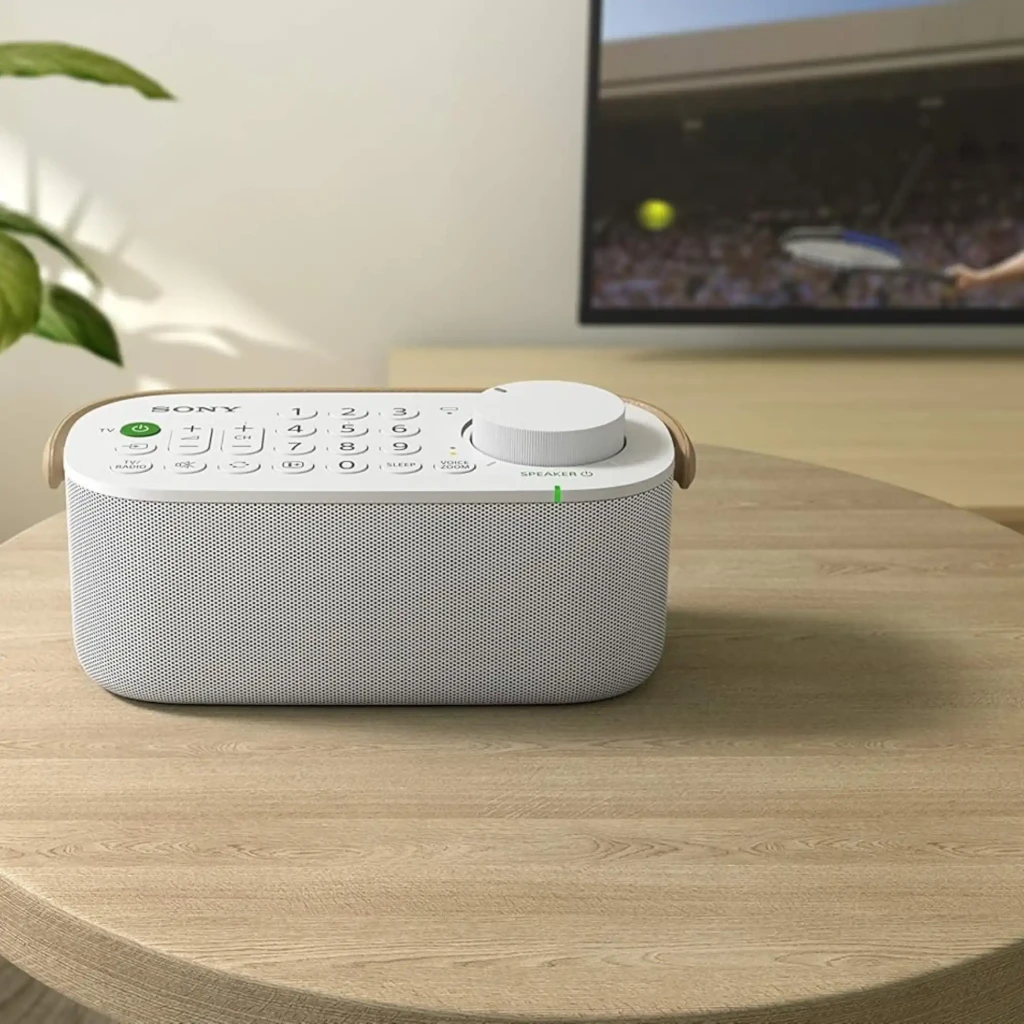 Sony SRS-LSR200 Bluetooth IPX2 Branco com grade metálica, botões grandes numéricos, botão liga verde, dial de volume amplo e alça lateral bege - Item4