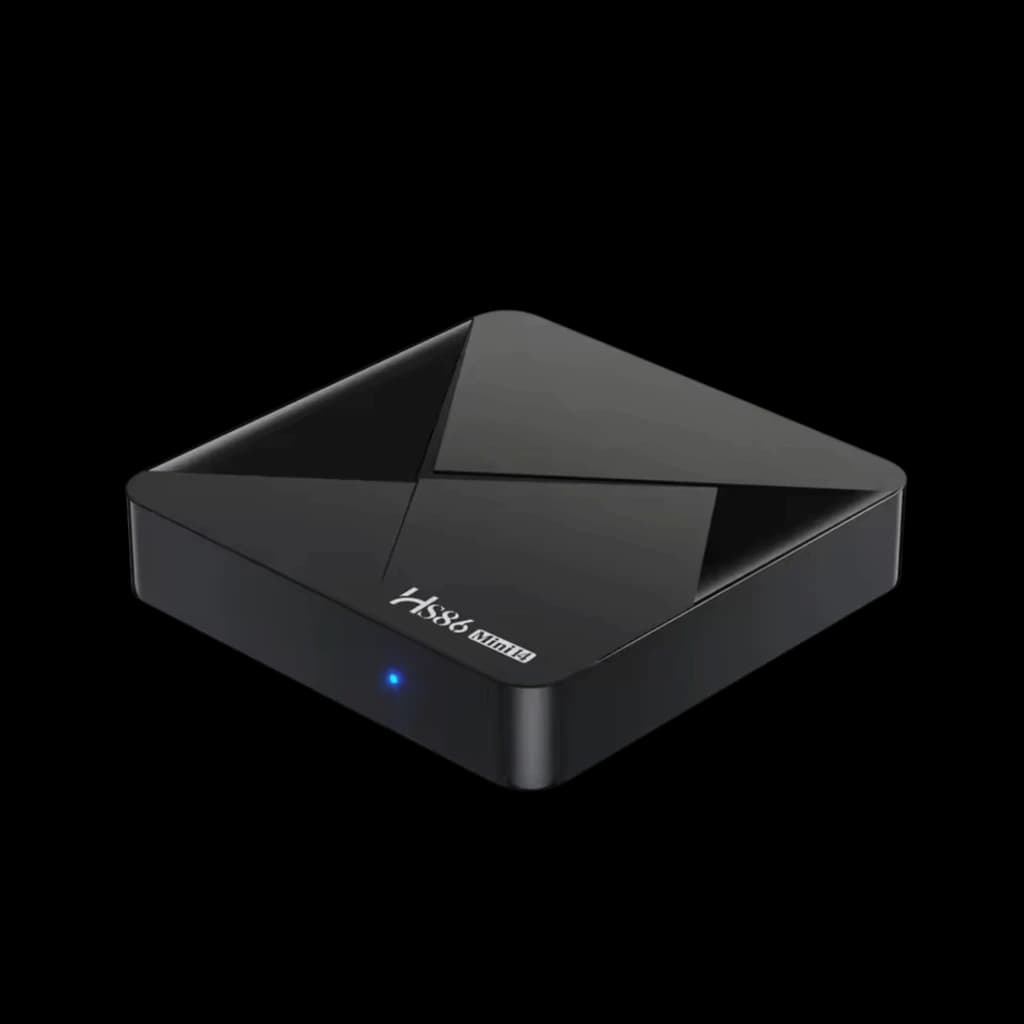 HS86 MINI14 Android TV Box compacto negro con diseño angular brillante, indicador LED azul frontal y puertos laterales; ideal para streaming 4K en sala o