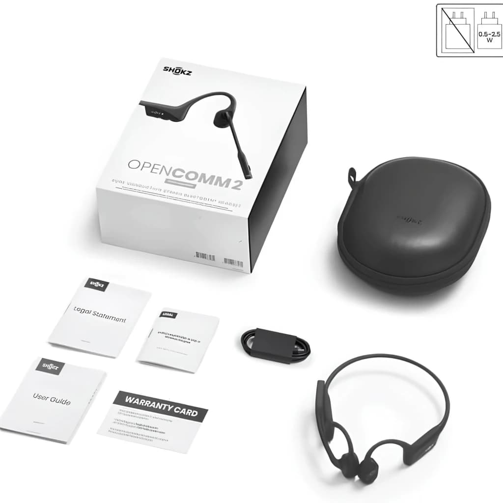 Shokz Opencomm 2 2025: auriculares de conducción ósea negros con micrófono boom DSP, diadema flexible, estuche rígido, cable de carga y manuales incluidos