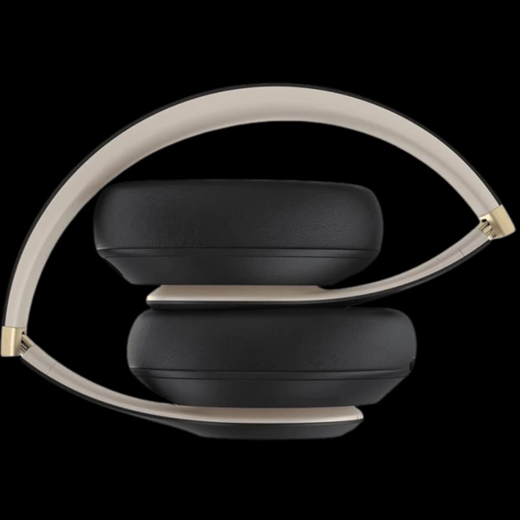 Beats Studio Pro ANC Noir Doré avec arceau beige élégamment courbé, coussinets noirs moelleux, design pliable compact, finitions dorées raffinées