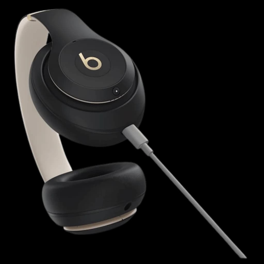 Beats Studio Pro ANC Noir/Doré - Casques Bluetooth avec arceau noir mat, coussinets ovales, logo b doré et câble audio gris detachable