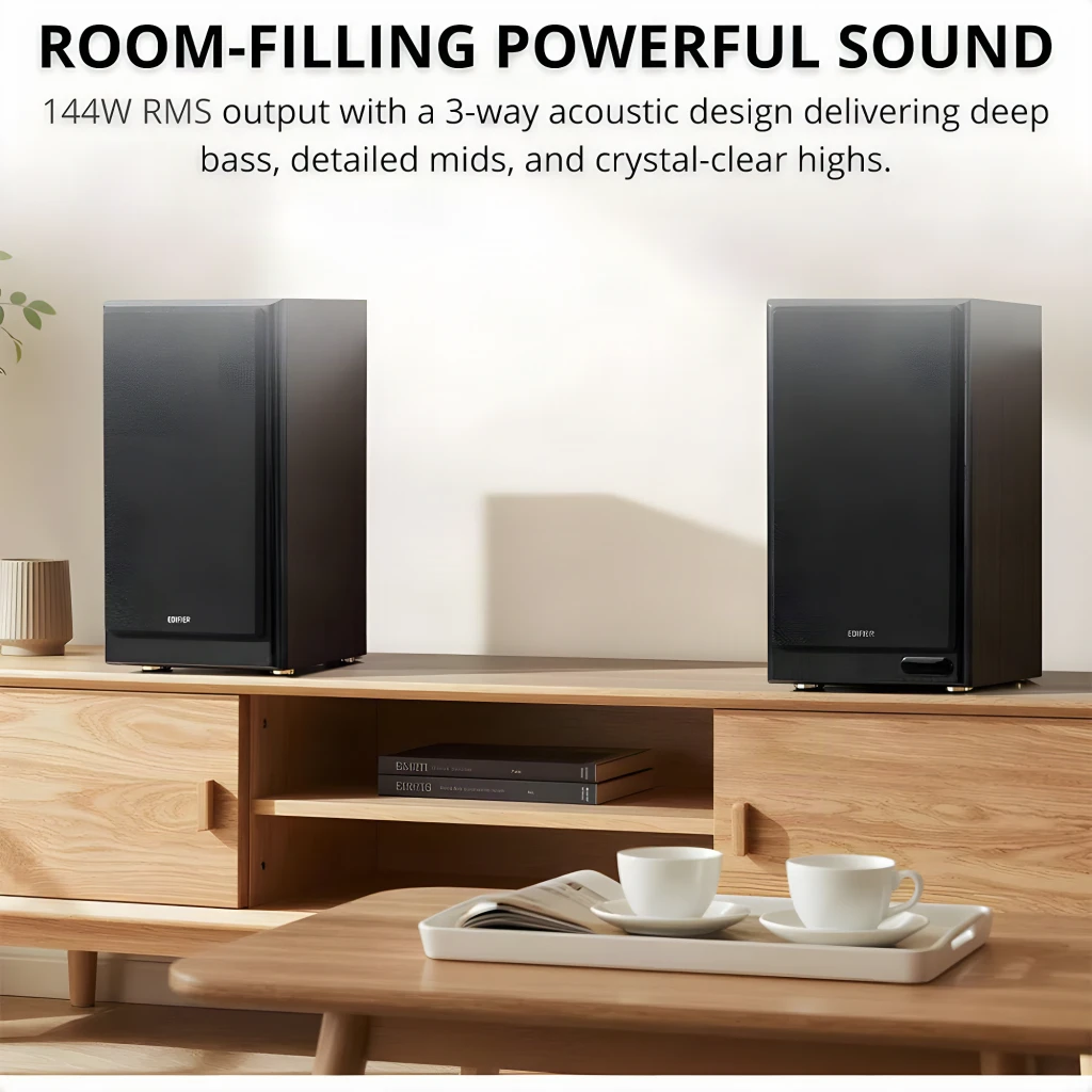 Par de altavoces de estantería negros con acabado en madera, rejilla textil removible y triple vía visible con woofer grande, midrange y tweeter frontal - Ítem6