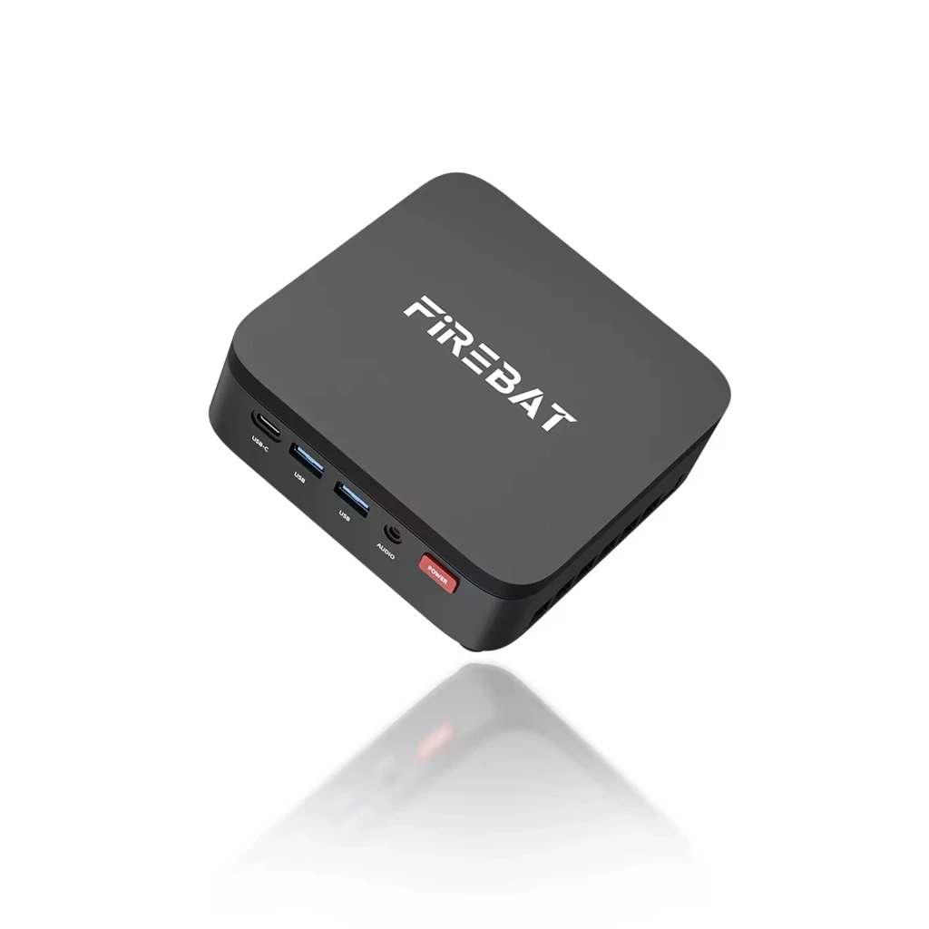 Mini PC Firebat R3 compacto em preto fosco, logo no topo, portas frontais USB-C, 2x USB, áudio e botão Power; laterais com grelhas de ventilação - Item1