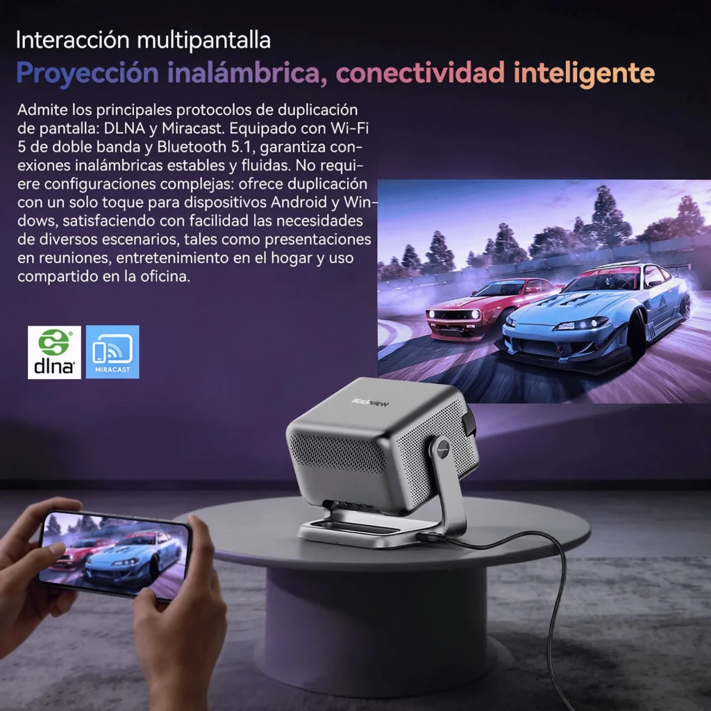 Proyector Blackview PV1000 Max plateado con lente grande multicolor, soporte integrado tipo asa, ventilación lateral y logotipo Dolby Audio en el frente - Ítem1