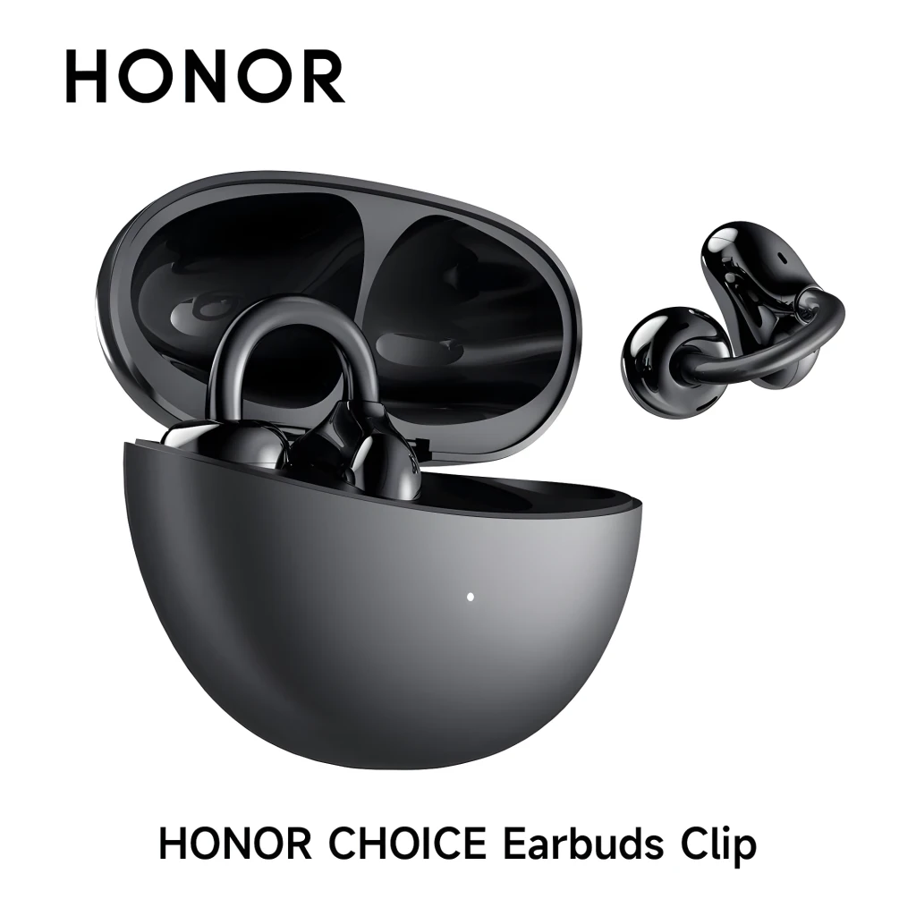 Boîtier noir compact ouvert montrant deux écouteurs open ear avec clip en anneau, embouts brillants, finition mate élégante, LED frontale discrète - Ítem6