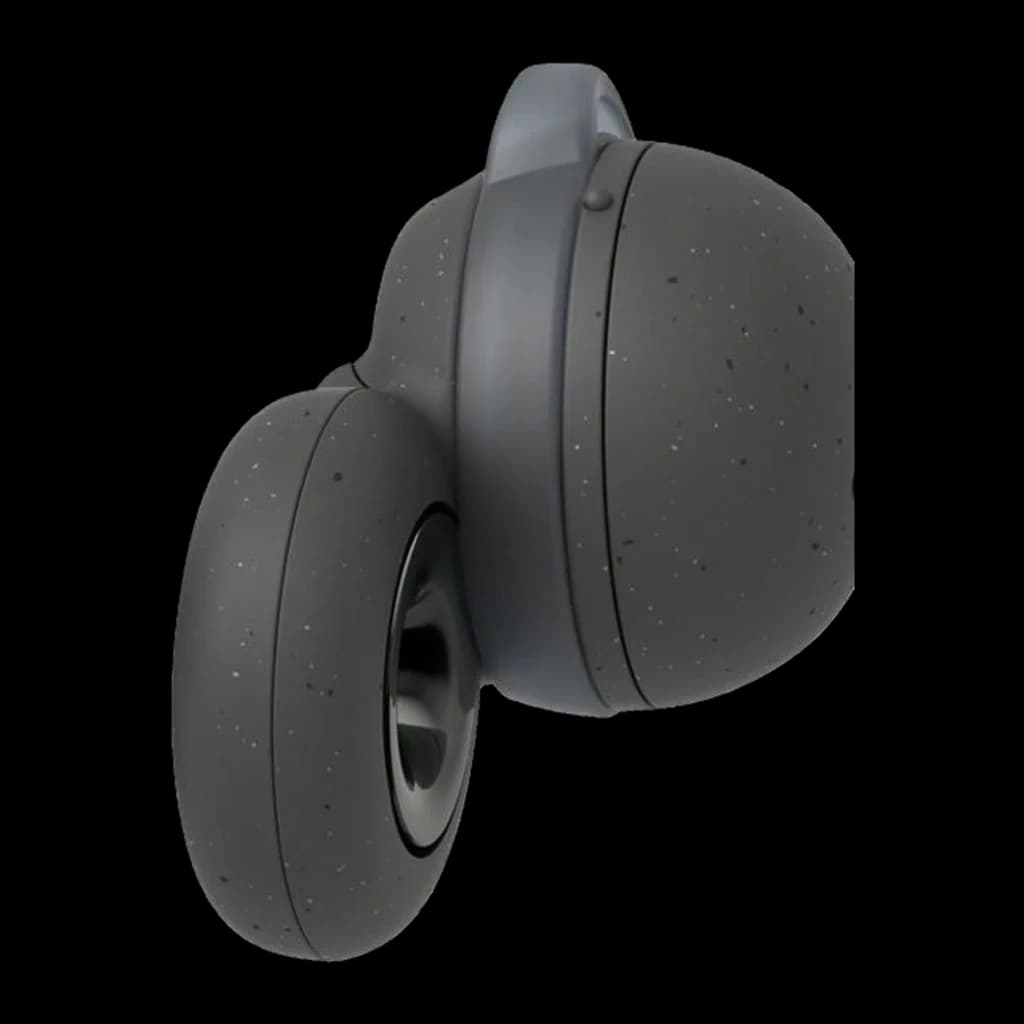 Auricular in ear gris con diseño abierto circular y acabado moteado, forma compacta de doble anillo, detalle de micrófono lateral y rejilla interna visible