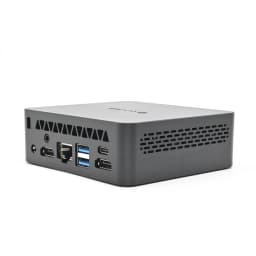 Mini PC MLLSE M3 Pro compacto en gris con múltiples puertos: USB-A azul, USB-C, HDMI, Ethernet y jack, rejillas de ventilación laterales y acabado mate
